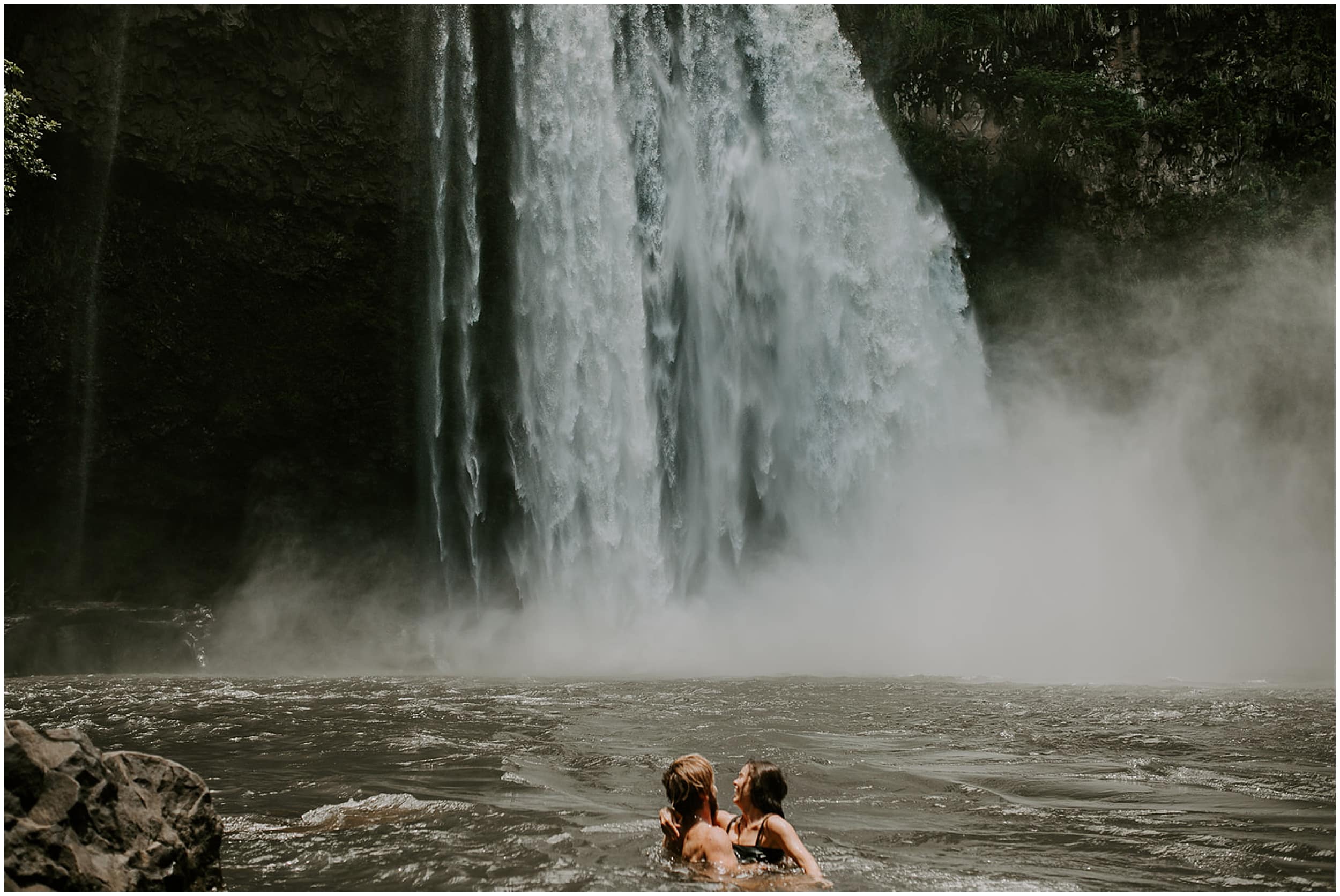 couple eloping at waterfall