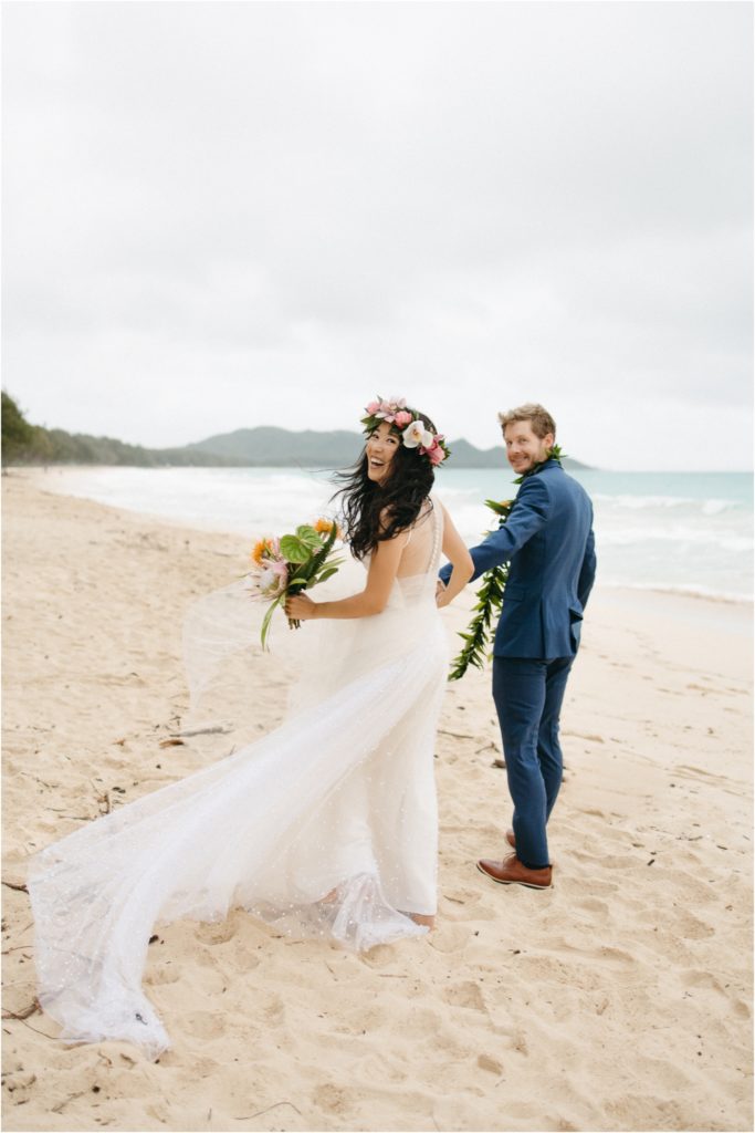 Bride in a jumpsuit by Amsale for her Oahu elopement