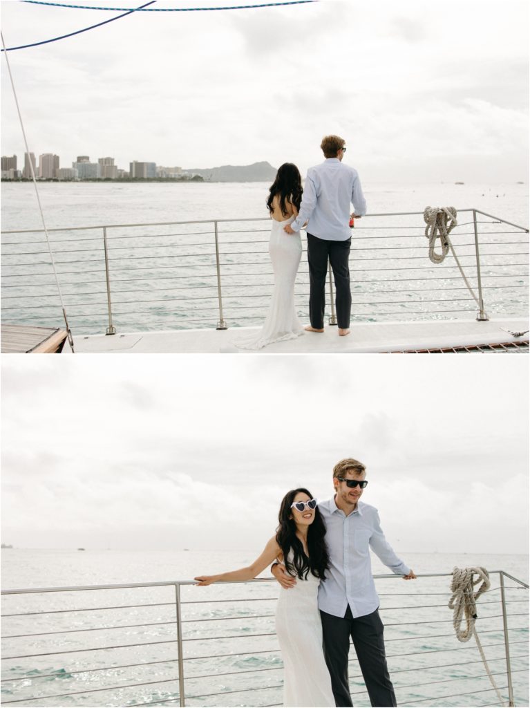 Bride and groom on a private Catamaran after their Waimanalo Beach Elopement