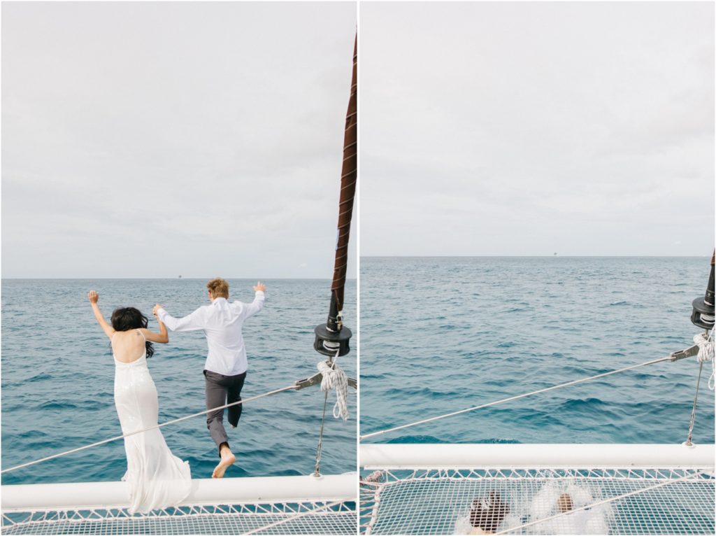 Bride and groom on a private Catamaran from Royal Hawaiian Catamaran