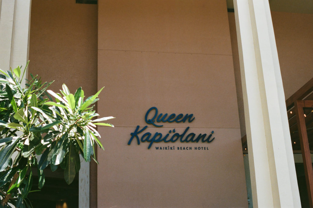 film picture of the front of the Queen Kapiolani Hotel at Waikiki