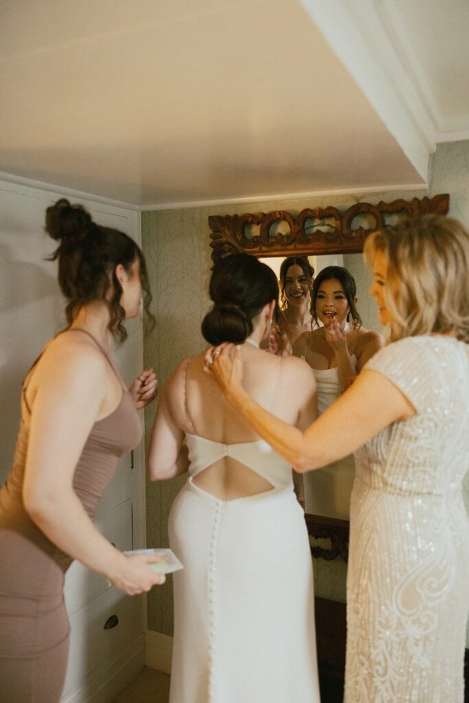 bride getting ready with her family