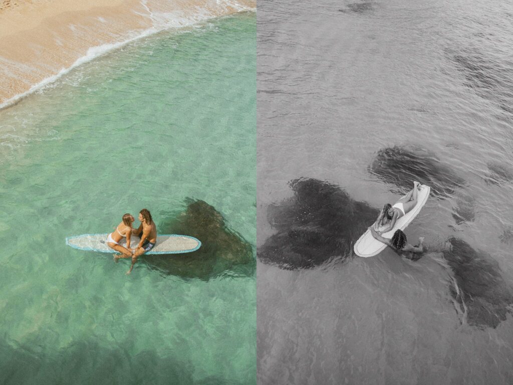 portraits of the couple sitting on the surfboard in the ocean together