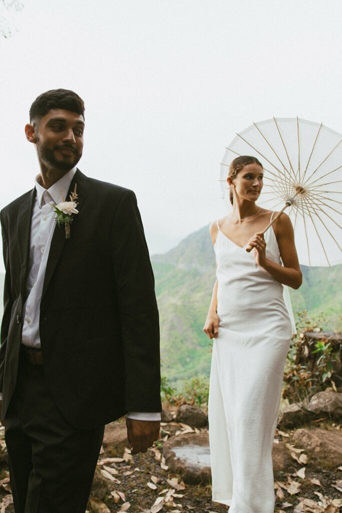 bride and groom are walking together to their zero-waste wedding