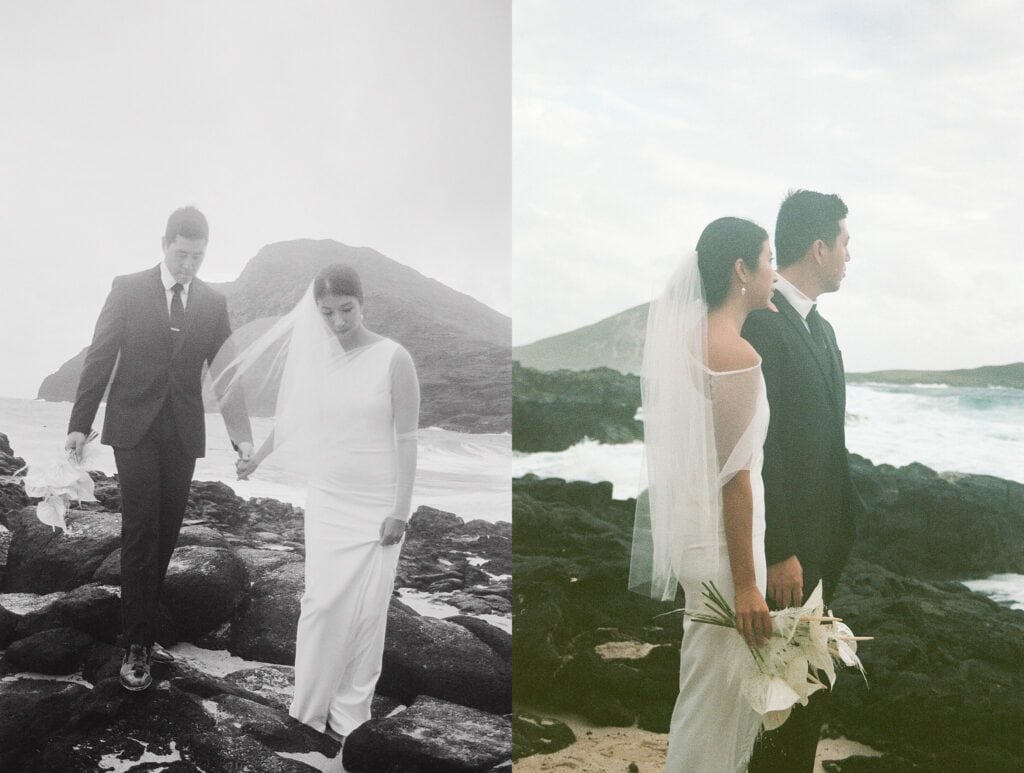 bride and groom walking along rocks on the shoreline