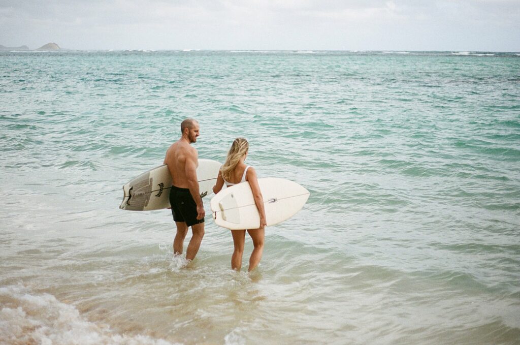 couple is about to go surf