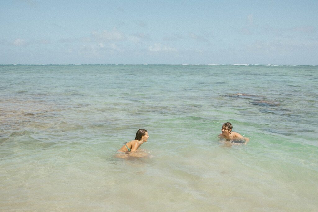 couple is playing in the water