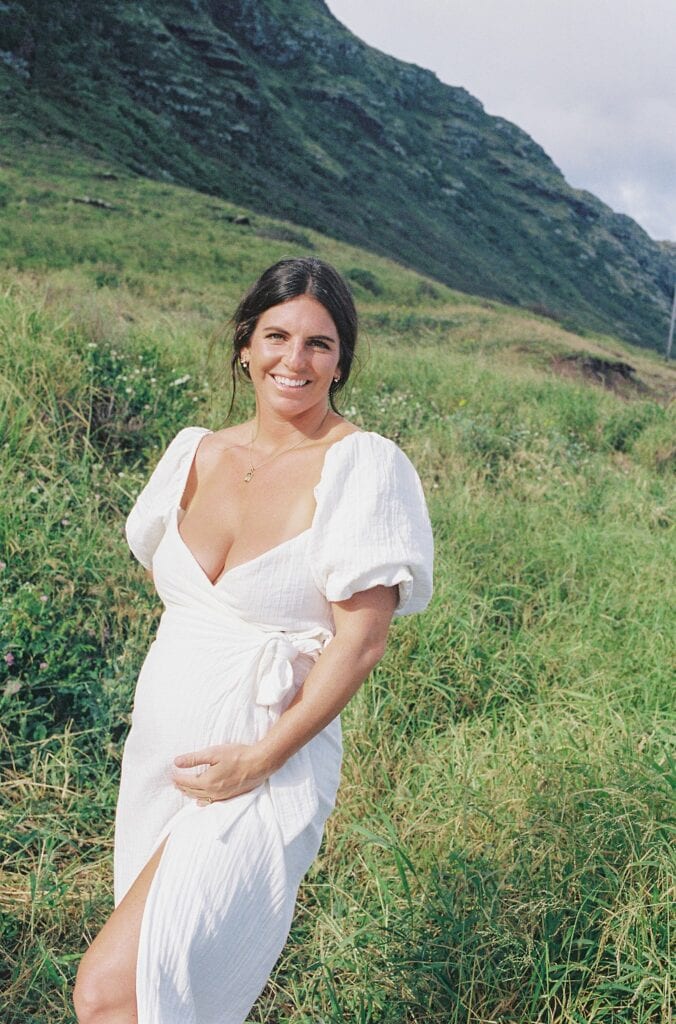 film portrait of molly in front of the mountains during their maternity photoshoot